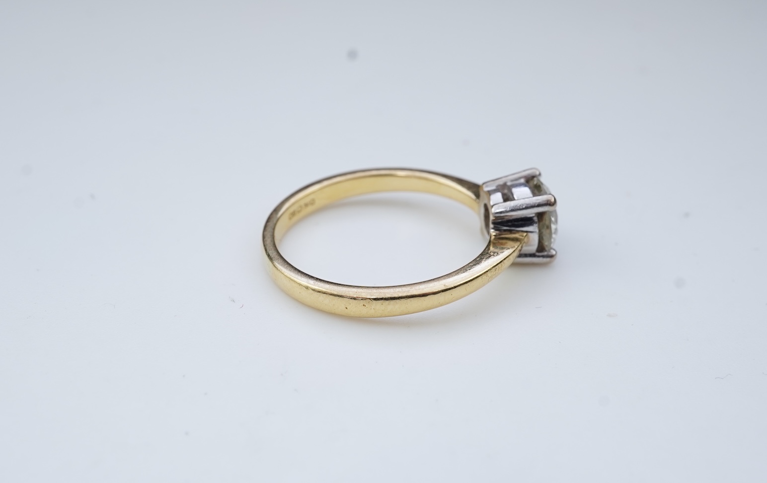 A diamond solitaire ring